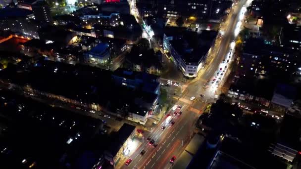 High Angle View of Illuminated Roads and Residential District of Central Luton Town of England During Night. Nagranie zrobione kamerą drona 4 listopada 2023 - Materiał filmowy, wideo