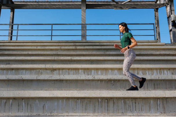 Stadium Workout: Active Woman in Sportswear - Photo, Image