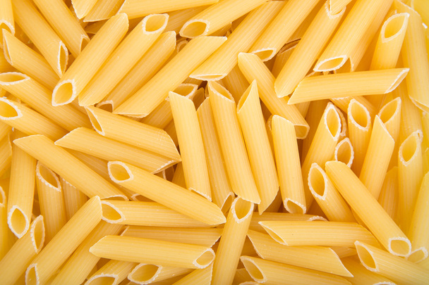 ruwe penne pasta - Foto, afbeelding