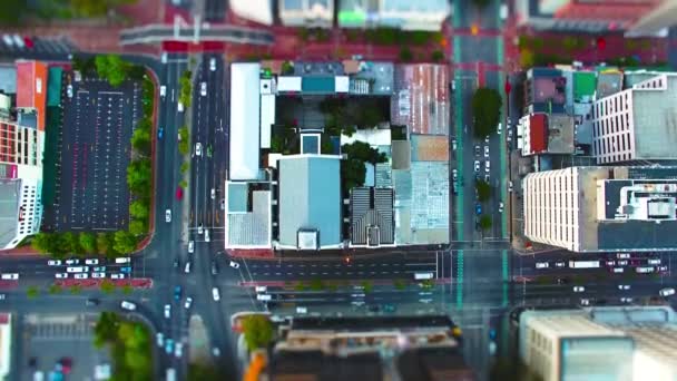 Drone, cars and city with buildings, development and industrial background for transportation or street. Aerial view, roads and traffic on highway with architecture, cbd and cape town urban landscape. - Footage, Video