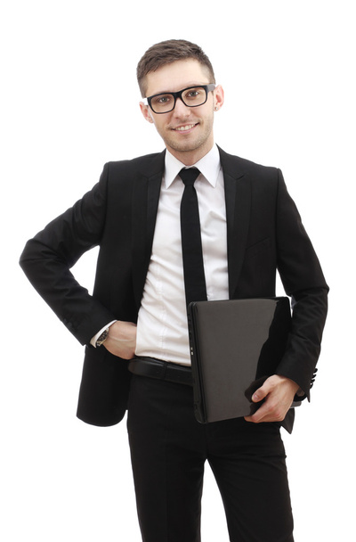 Business man holding a laptop and smiling. - Foto, Imagem