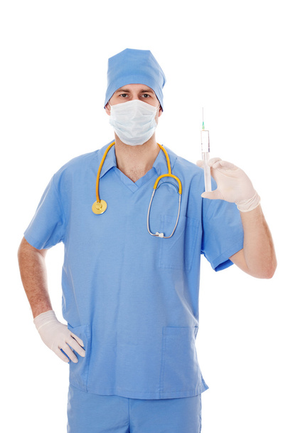 Male doctor holding a syringe in his hand. - Foto, imagen