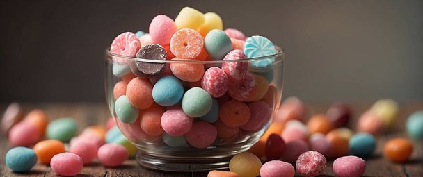 πολύχρωμα γλυκά σε ένα μπολ σε ένα τραπέζι, κοντά - Φωτογραφία, εικόνα