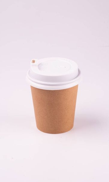 craft paper coffee cup with lid for taking espresso in coffee shops and angle - Photo, Image