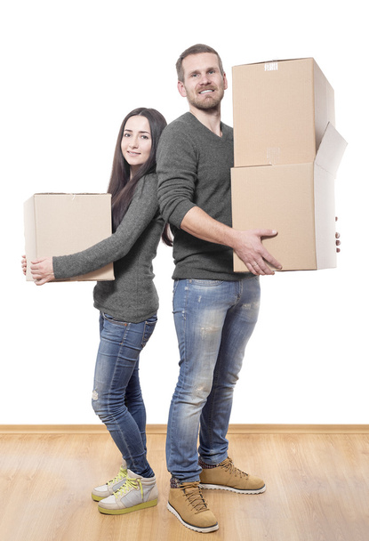 Couple with moving boxes. - Photo, Image