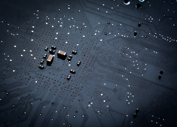 Close up of a printed black computer circuit board - 写真・画像