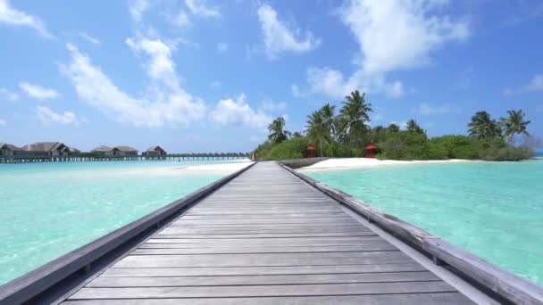 Water villas in front of sand beach - Footage, Video
