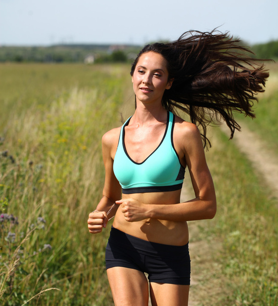 Woman Runner. Fitness Girl Running outdoors  - Fotoğraf, Görsel