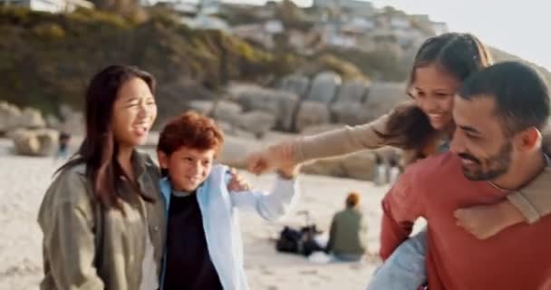 Beach, love and happy family in nature with hug, piggyback and friendly fight while bonding. Travel, freedom and excited children with parents at the sea for holiday, vacation or adventure in Florida. - Footage, Video