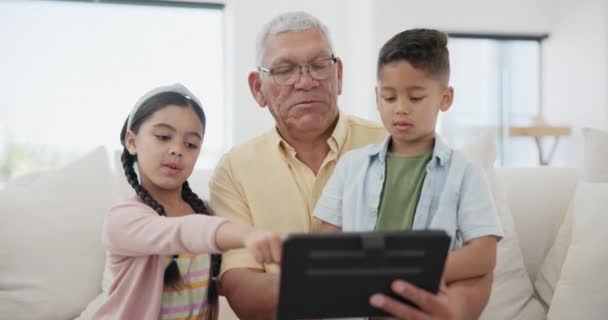 Relax, kid or grandpa with tablet for elearning or studying for remote learning education on sofa. Family, siblings talking or grandfather with kids reading ebook or streaming video or movies at home. - Footage, Video