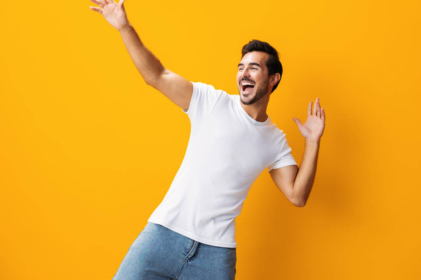 Blank man studio copy white isolated yellow clothing shirt jeans smile mockup model front clothes template background t-shirt casual lifestyle space view portrait - Photo, Image