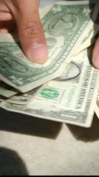 close up man counting dollars bills - Záběry, video