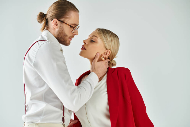 appealing boss and his secretary hugging and kissing lovingly while in office, work affair - Fotografie, Obrázek