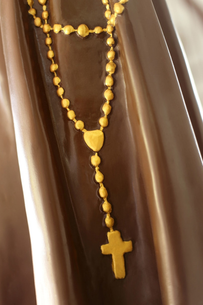 Rosary helmiä tai krusifiksi patsas
. - Valokuva, kuva