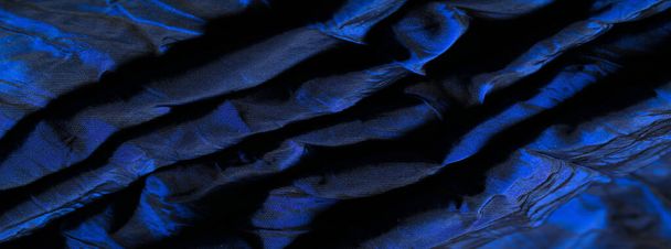 Blue silk fabric. Come on, let this Electric Blue silk fabric be your next embellishment! Infinitely captivating with its elasticity, this miracle embodies perfection. - Photo, Image