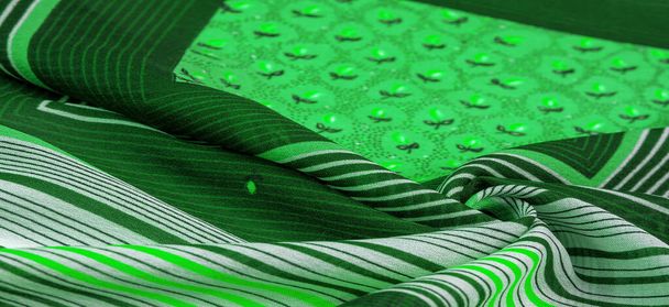 hedvábná tkanina, zelené pozadí, s pruhovaným vzorem bílých a zelených čar, španělské téma, textura, vzor, kolekce - Fotografie, Obrázek