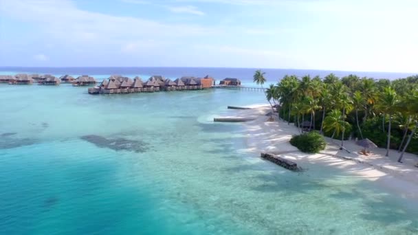 Luxury overwater bungalows in tropical lagoon - Footage, Video