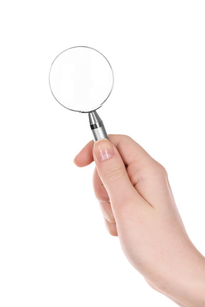 Female hand with magnifying glass isolated on white - Foto, immagini
