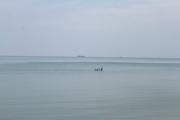 Fishing boat in the sea, fishing boat in the sea. - Photo, Image