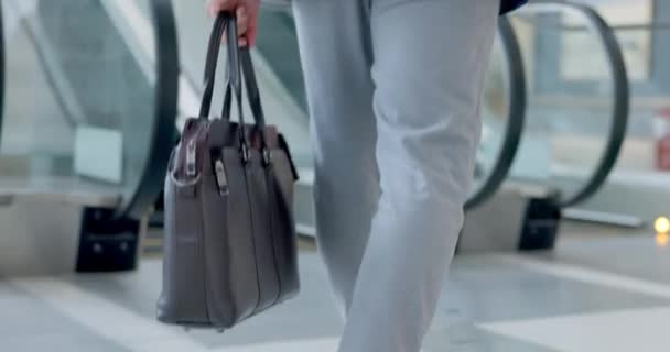 Businessman, walking and escalator in office lobby or entrance to building of work, business and corporate convention. Moving, stairs and man travel with bag for laptop or briefcase in airport. - Footage, Video