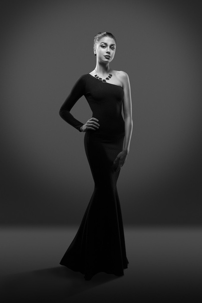 beautiful woman model posing in elegant dress in the studio - Φωτογραφία, εικόνα