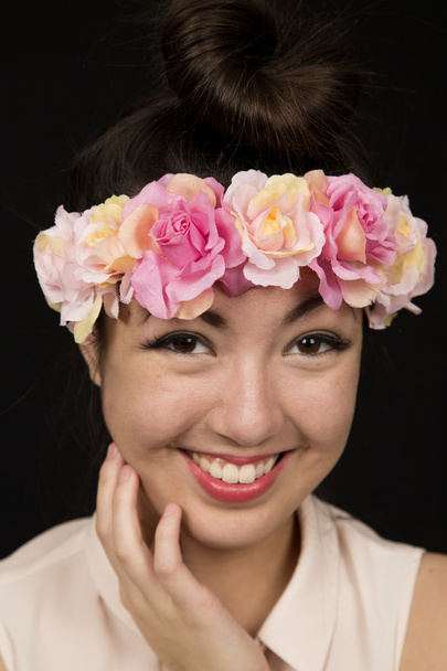 Teen girl beauty close up wearing a floral crown - Фото, изображение