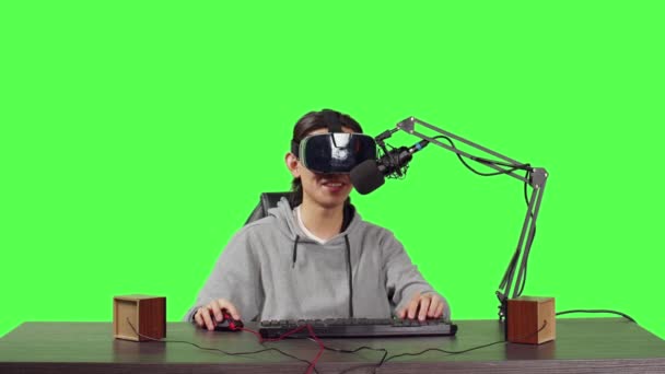 POV of content creator uses vr headset to broadcast live adventure gameplay, sitting at his workstation to play web videogames. Person blogger recording stream, virtual reality headset. - Footage, Video