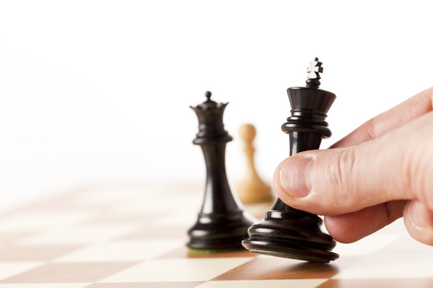 Pohyblivé šachové figurky na šachovnici - Fotografie, Obrázek