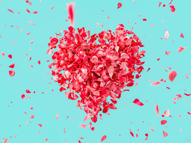 Renderização 3D de uma forma de coração composta por pétalas vermelhas vibrantes flutuando e espalhando em um fundo turquesa brilhante. - Foto, Imagem