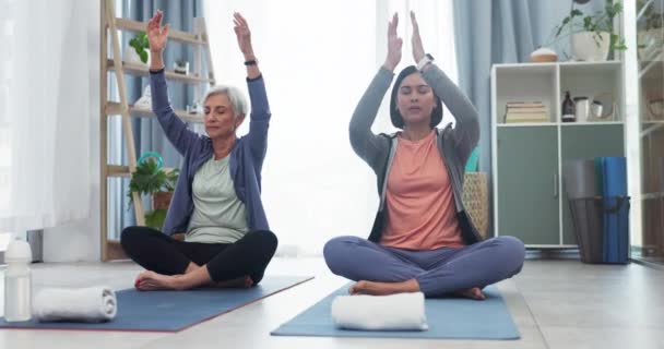 Mother, adult daughter and yoga, meditation and fitness, bonding with mindfulness and self care, spiritual and zen. Peace, calm and women in exercise class, holistic and healing in gym with wellness. - Footage, Video