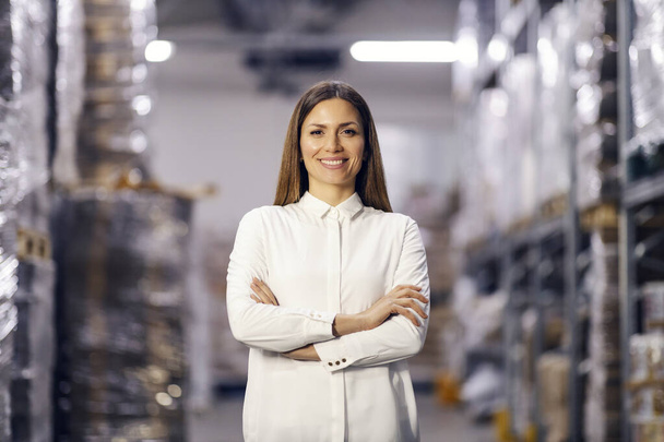 Portrait of female storage manager smiling at the camera. - Photo, Image
