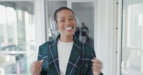 Happy, music and business with black woman and dance in office for celebration, creative and relax. Happiness, streaming and headphones with female employee in startup for funny, excited and podcast. - Footage, Video