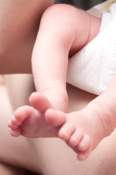 This is a closeup of a newborn legs - Foto, Imagen
