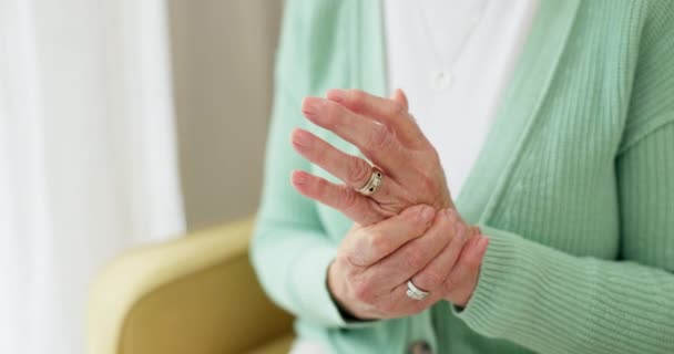 Hands, pain and arthritis with a senior woman in her nursing home, struggling with a medical injury or problem. Healthcare, ache or carpal tunnel with an elderly resident in an assisted living house. - Séquence, vidéo