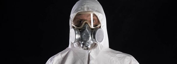 man in white chemical overalls - Photo, Image