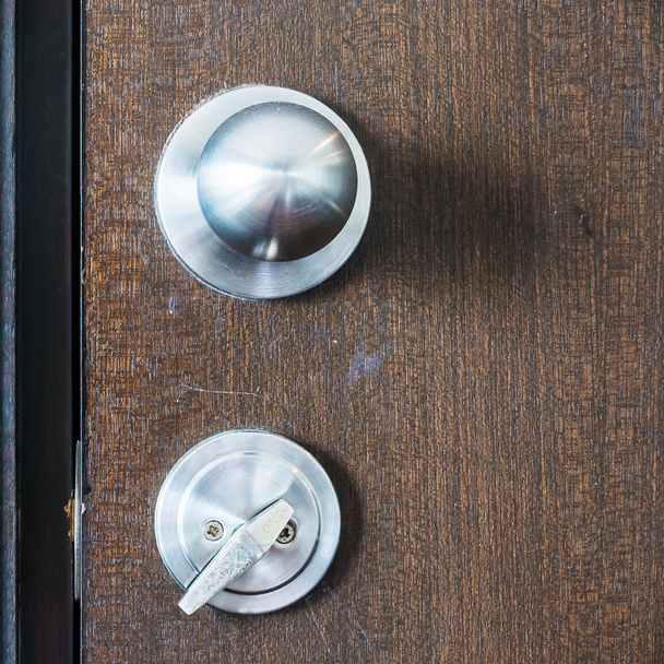 Zilveren deurknop - Foto, afbeelding