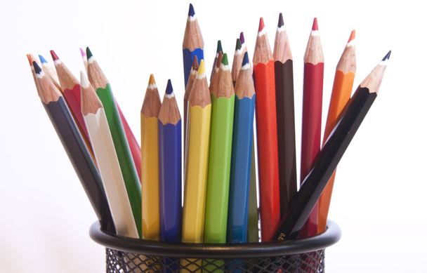 Different coloured pencils stood in pot - Foto, Bild