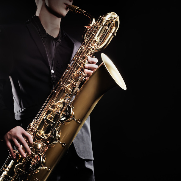 Saxophone Saxophonist with baritone sax - Zdjęcie, obraz