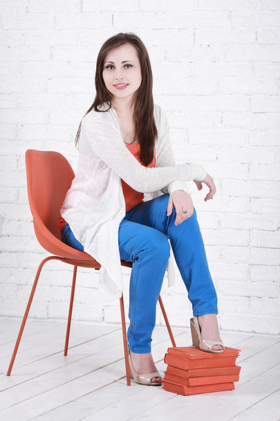 Teenage girl sitting - Photo, image