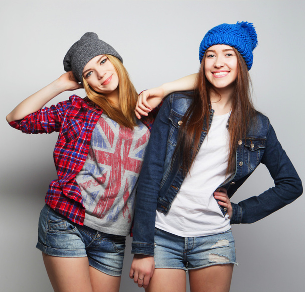 two stylish sexy hipster girls best friends - Фото, изображение