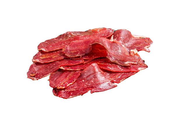 Dried sliced basturma, cured beef meat ready for eat. Isolated, white background - Photo, Image