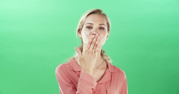Green screen, face and woman with air kiss in studio for love, care or flirting gesture on mockup background. Emoji, portrait and female model with thank you, hands or expression for valentines day. - Footage, Video