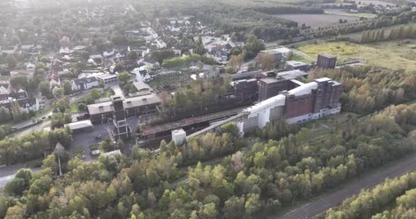 The Kokerei Hansa coking factory and industrial complex in Dortmund, which is a museum, nature park, and event location in the Dortmund district of Huckarde. Aerial drone view. - Footage, Video