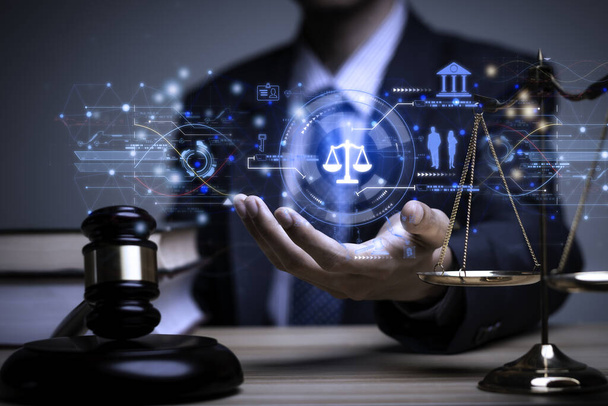 Lawyer's hand concept Justice with Judge gavel, Businessman in suit or Hiring lawyers in the digital system. Legal law, prosecution, legal adviser, lawsuit, detective, investigation,legal consultant.	 - Фото, зображення