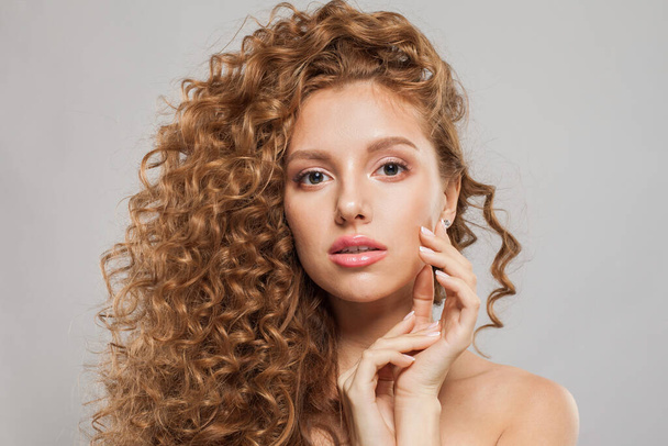 Fashionable woman fashion model with long wavy hairstyle, natural makeup and clear skin. Haircare, facial treatment and skincare concept - Photo, Image