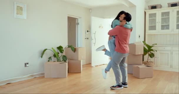 Homeowner, spin and couple with love, real estate and happiness with romance, excited and celebration. Romantic, man or woman with motion, property and apartment with marriage, success or achievement. - Footage, Video