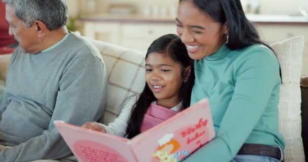 Book, relax and storytelling with mother and daughter on sofa for reading, fairytale and fantasy. Happy, smile and learning with woman and child in living room in family home for child development. - Footage, Video