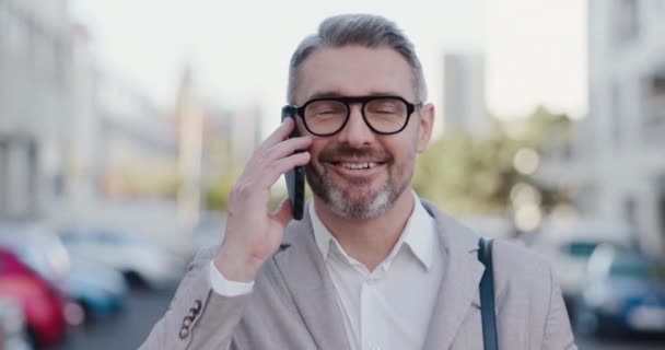 Talking, city and a businessman on a phone call in the morning for work, networking or planning. Thinking, contact and a mature employee or ceo speaking on a mobile for communication or conversation. - Footage, Video