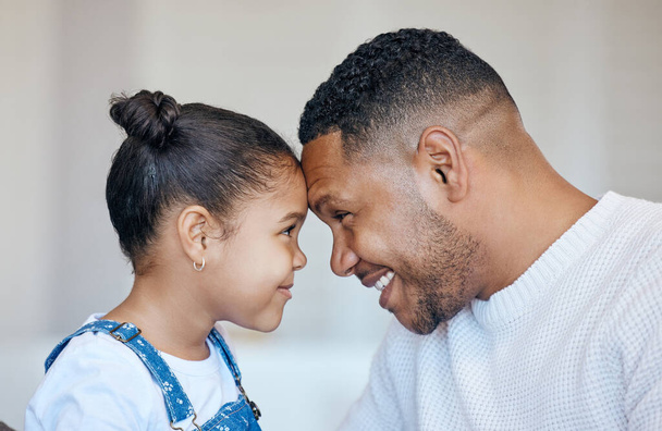 Child, face profile and happy family father, papa or Brazil man care, support and home happiness for young girl. Youth daughter, forehead and apartment dad bonding, smile or parent connect with kid. - Фото, изображение
