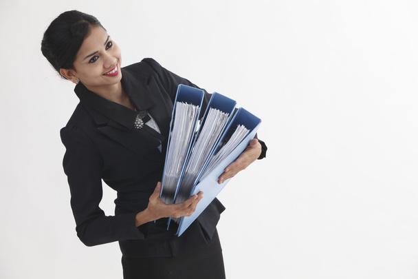 Business woman holding files - Zdjęcie, obraz